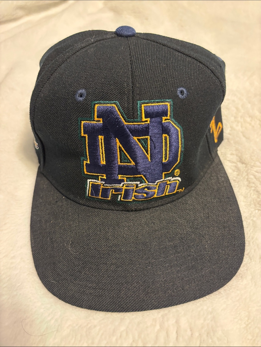 Zephyr Black Snapback Hat with Notre Dame ND Logo in Blue and Gold